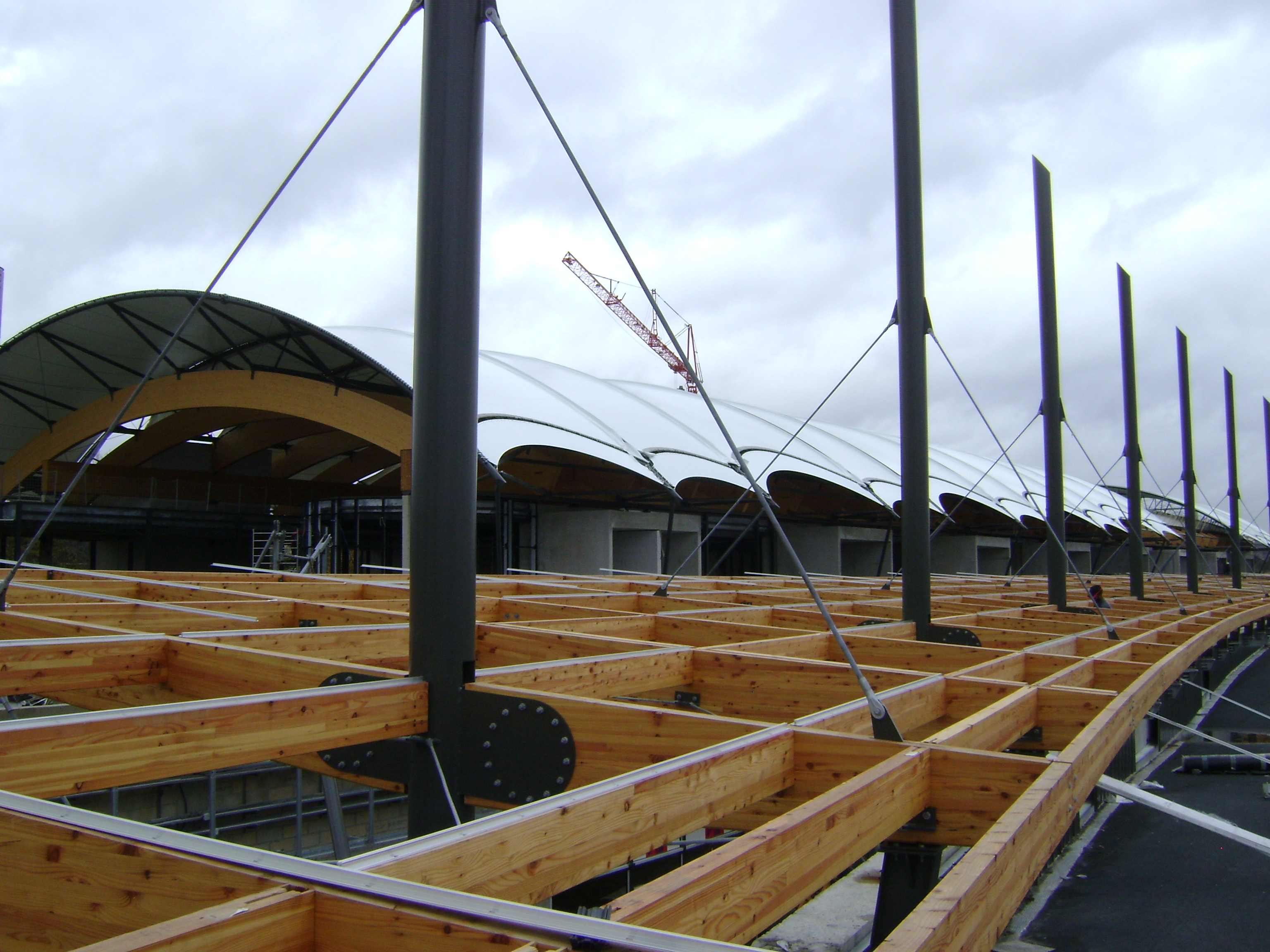 weisrock-vosges-lamelle-bois-charpente-construction-glulam-auvent